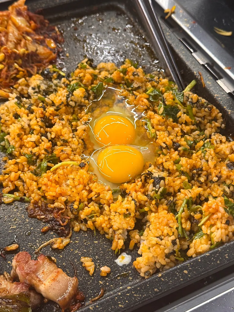Lettuce fried rice being cooked on the grill