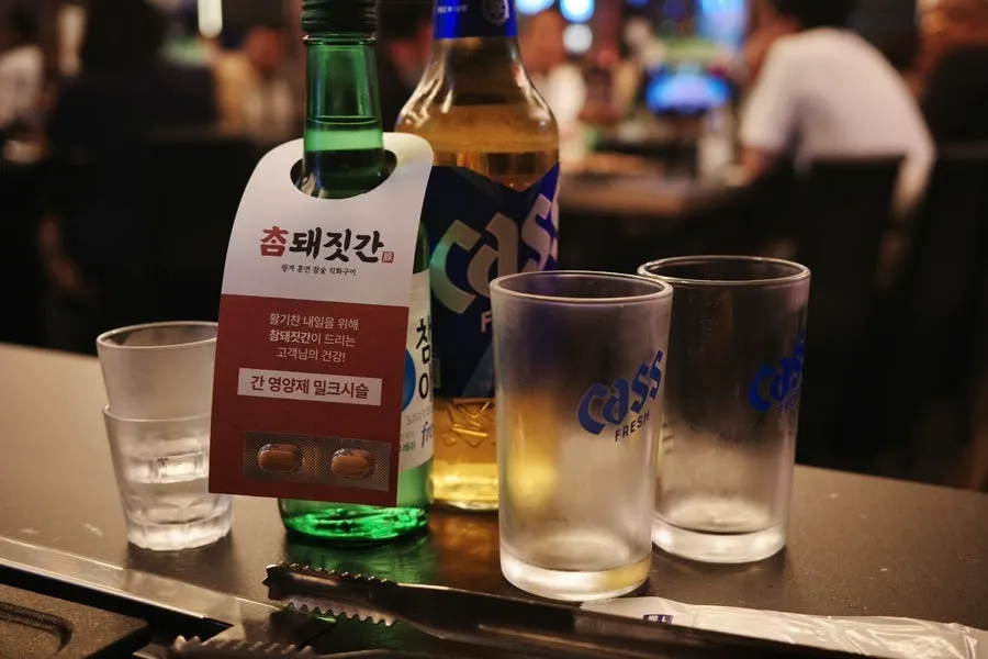Soju and pork belly at Cham Dwaejitgan Jongno Main Branch