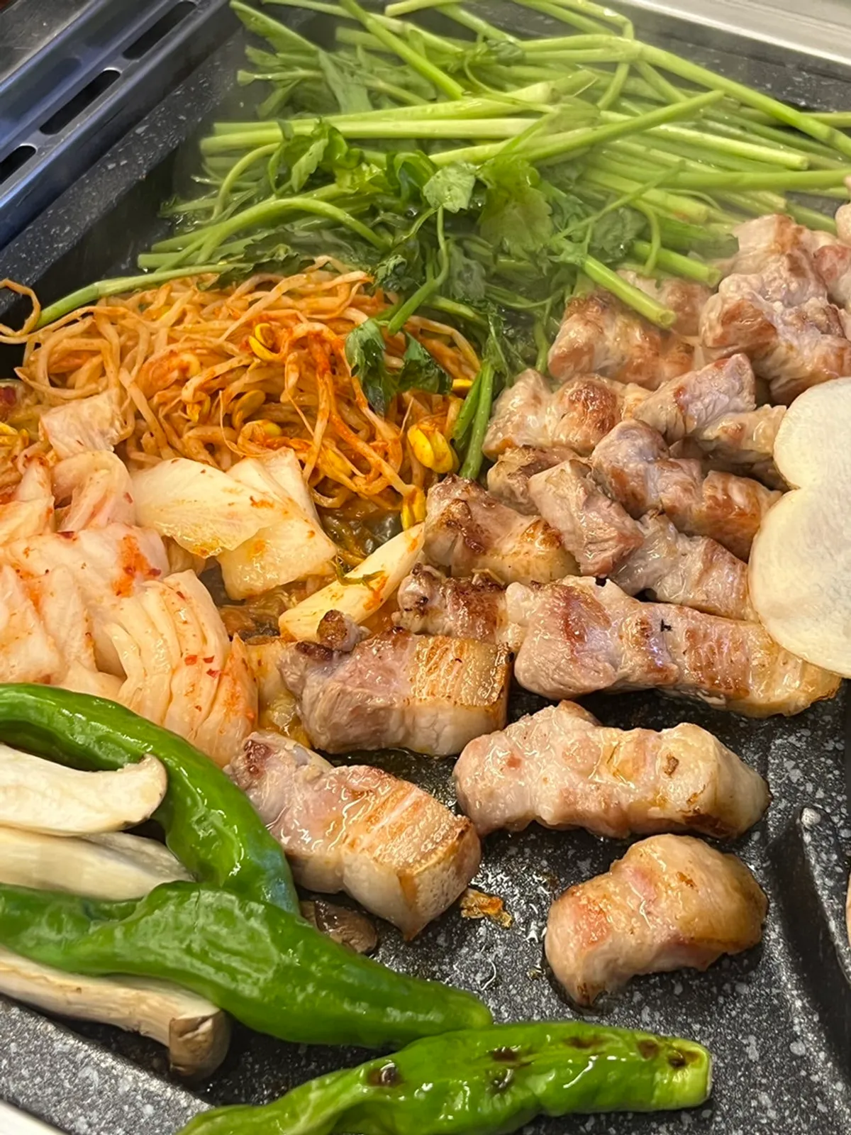 Pork belly table setting at Cham Dwaejitgan Jongno Main Branch