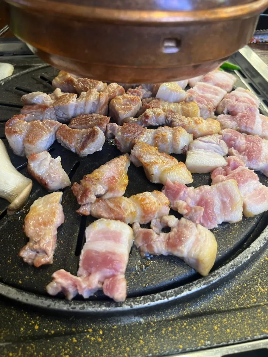 Cross-section of juicy grilled pork belly