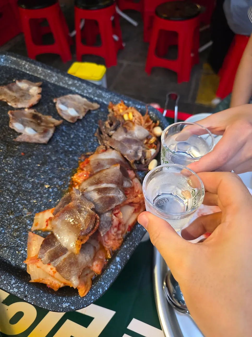 Pork belly and grilled kimchi on the outdoor-tent grill