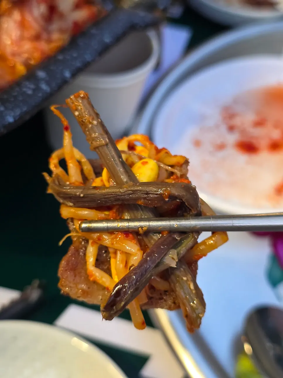 Pork belly and grilled kimchi wrapped in lettuce