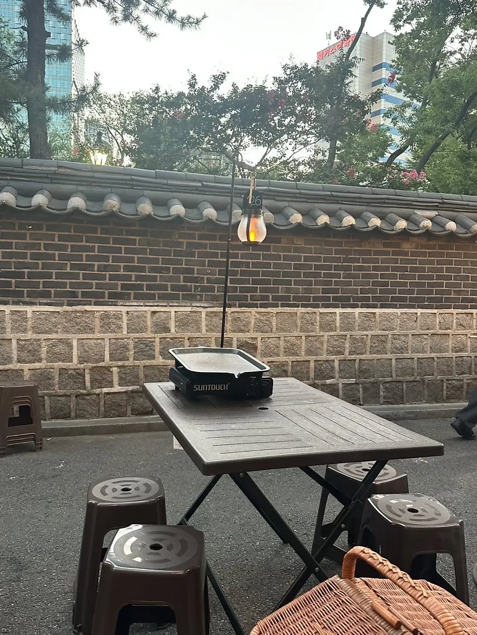 Outdoor tables and grills set up for outdoor seating