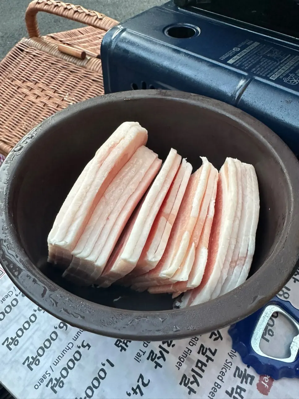 Two servings of frozen pork belly on a plate