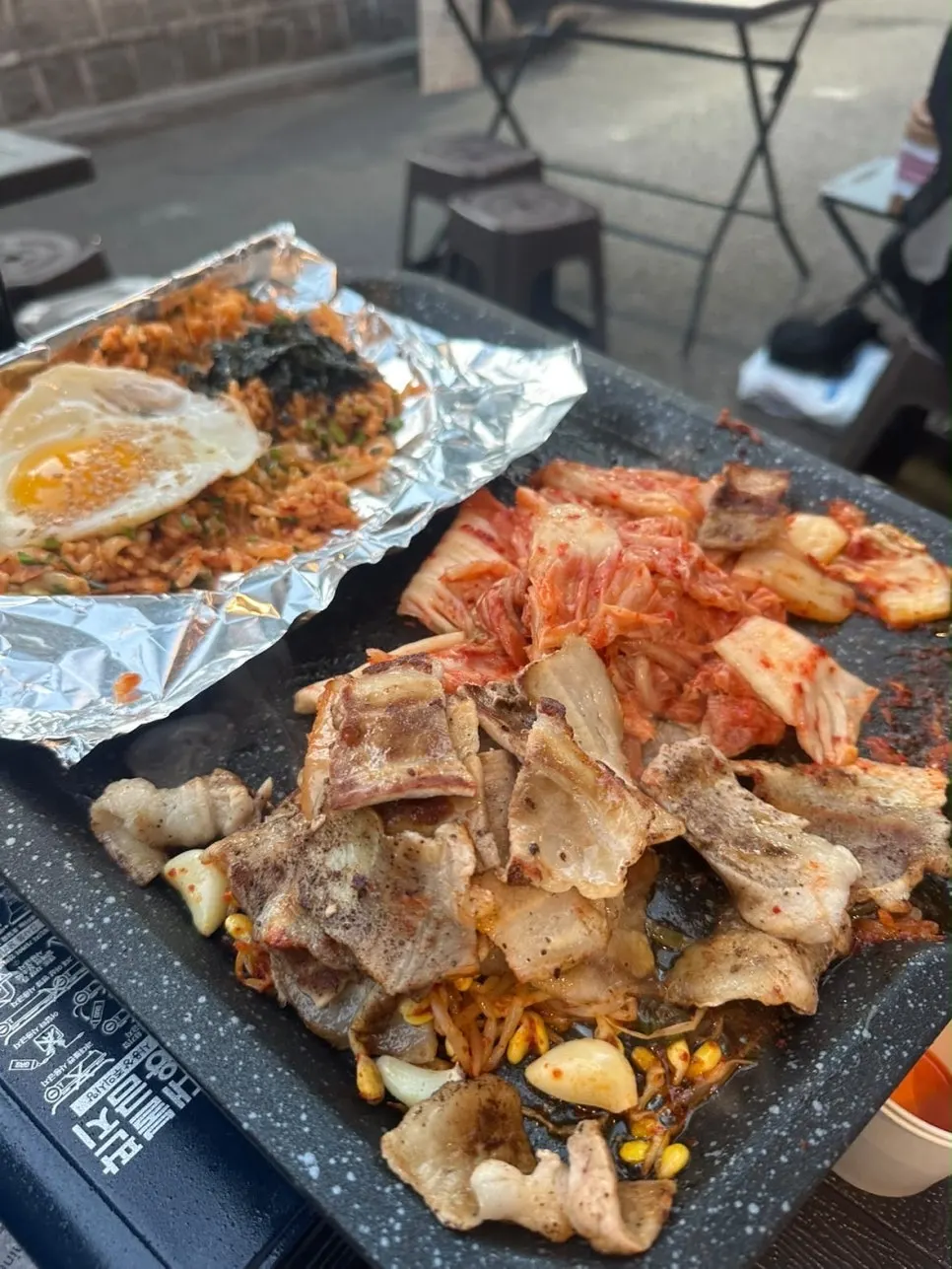 A thin slice of grilled pork belly
