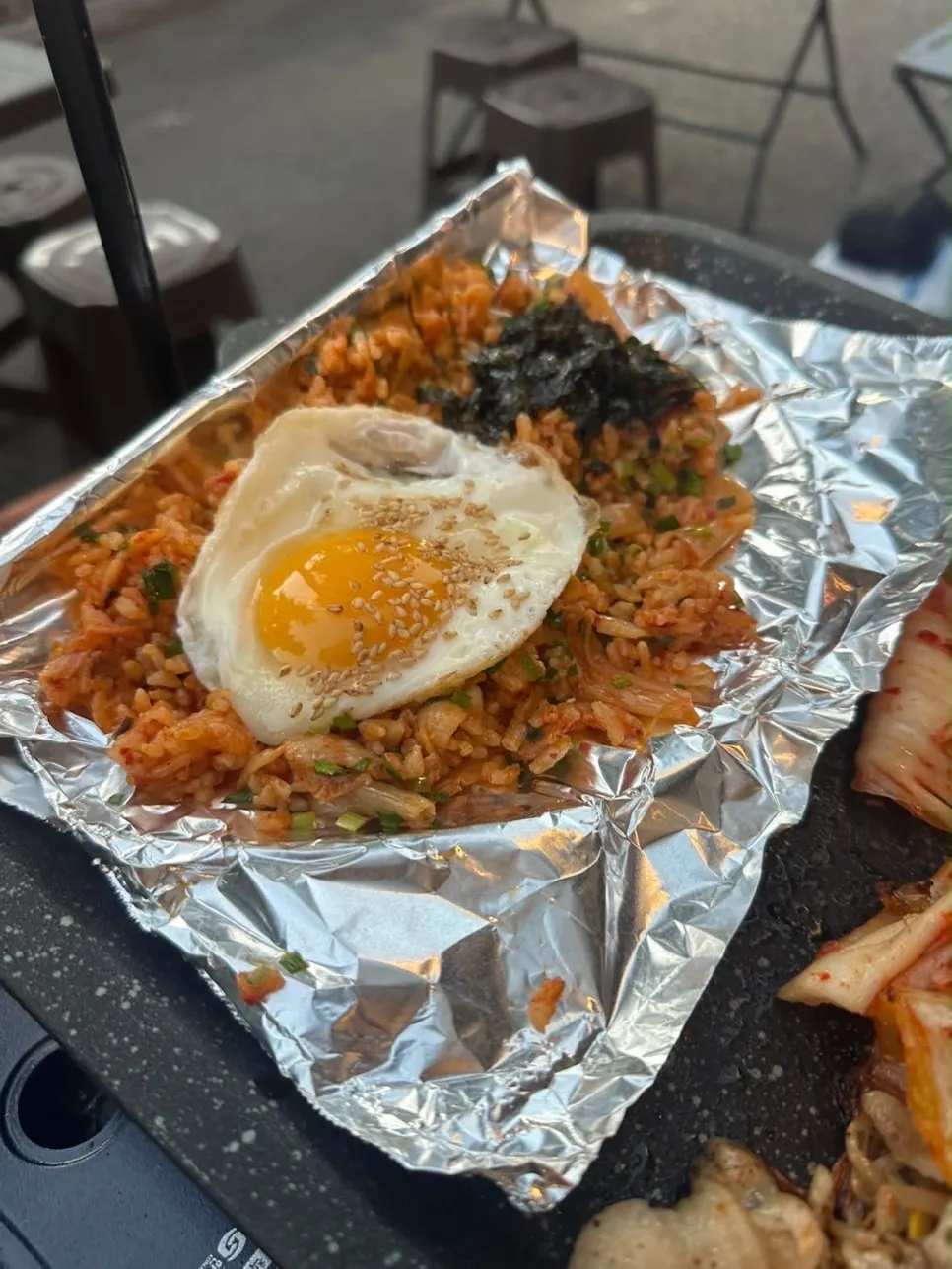 Savory kimchi fried rice finished on the grill