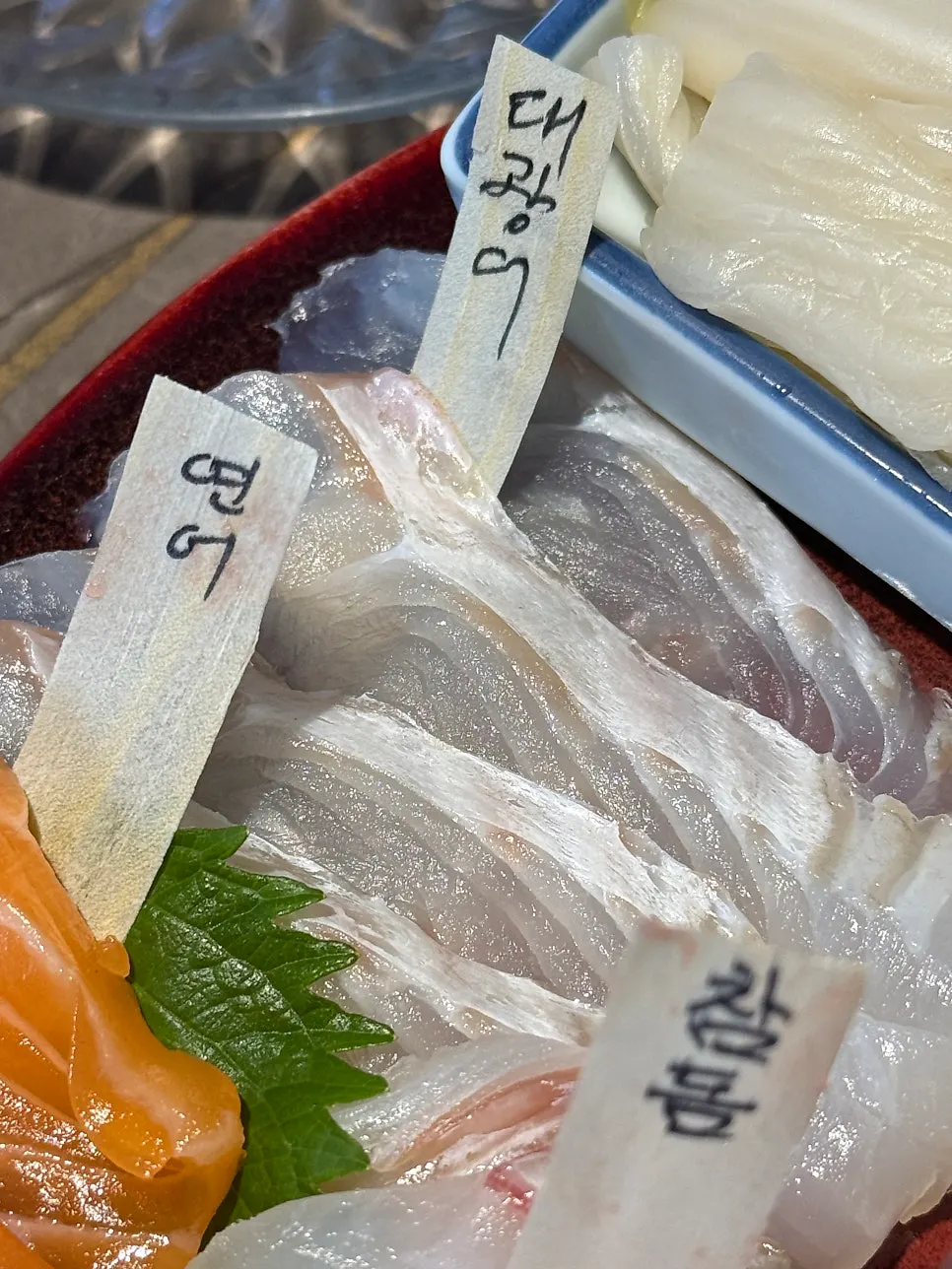 Close-up of a single piece of aged sashimi