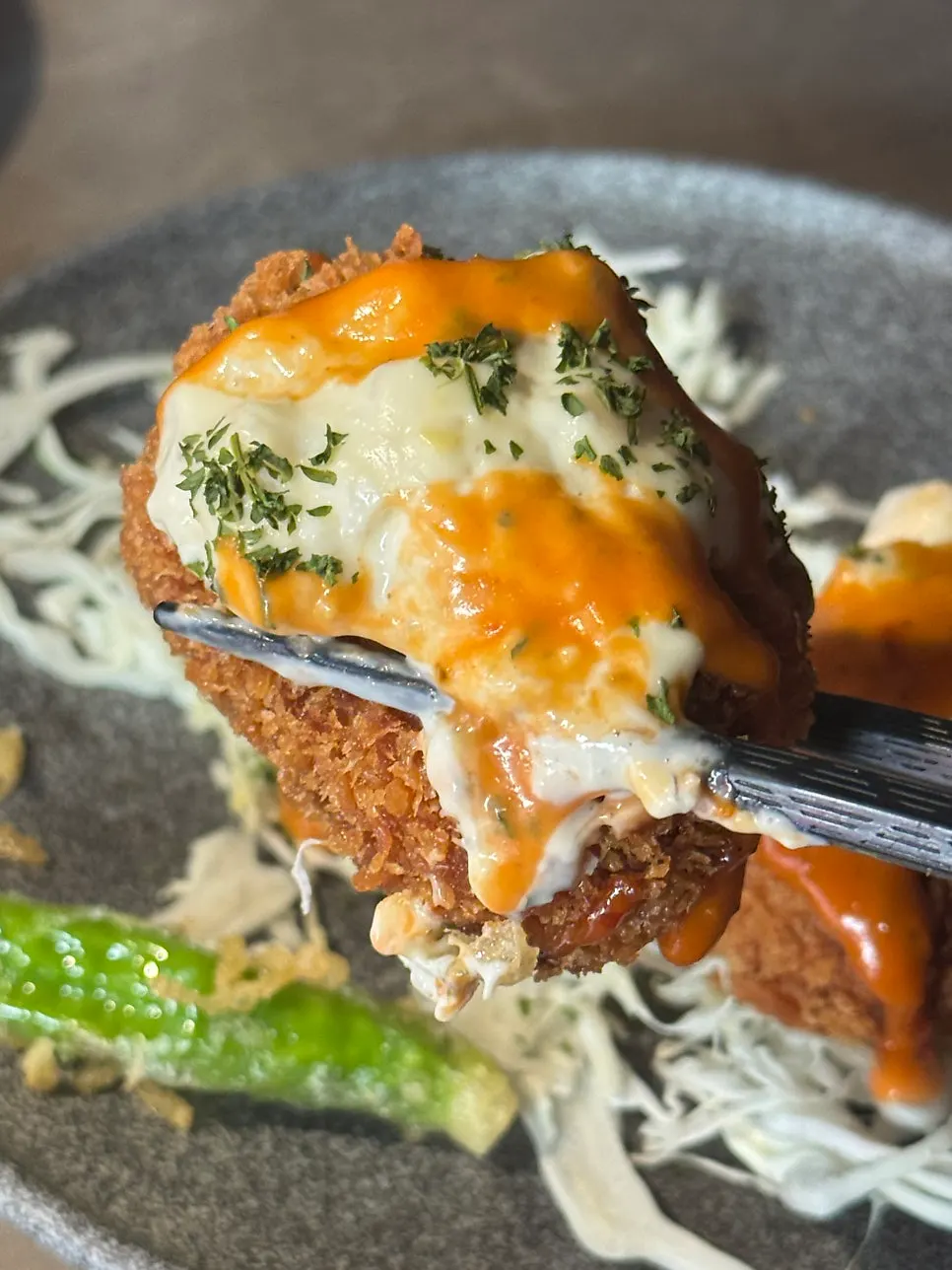 Cross-section of a crispy fried mentaiko croquette