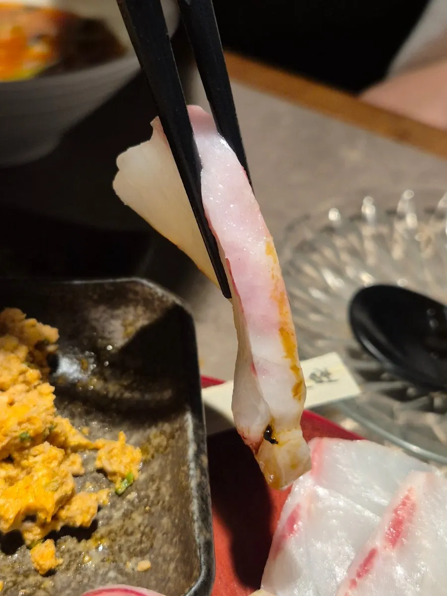 Close-up of chewy aged sashimi texture