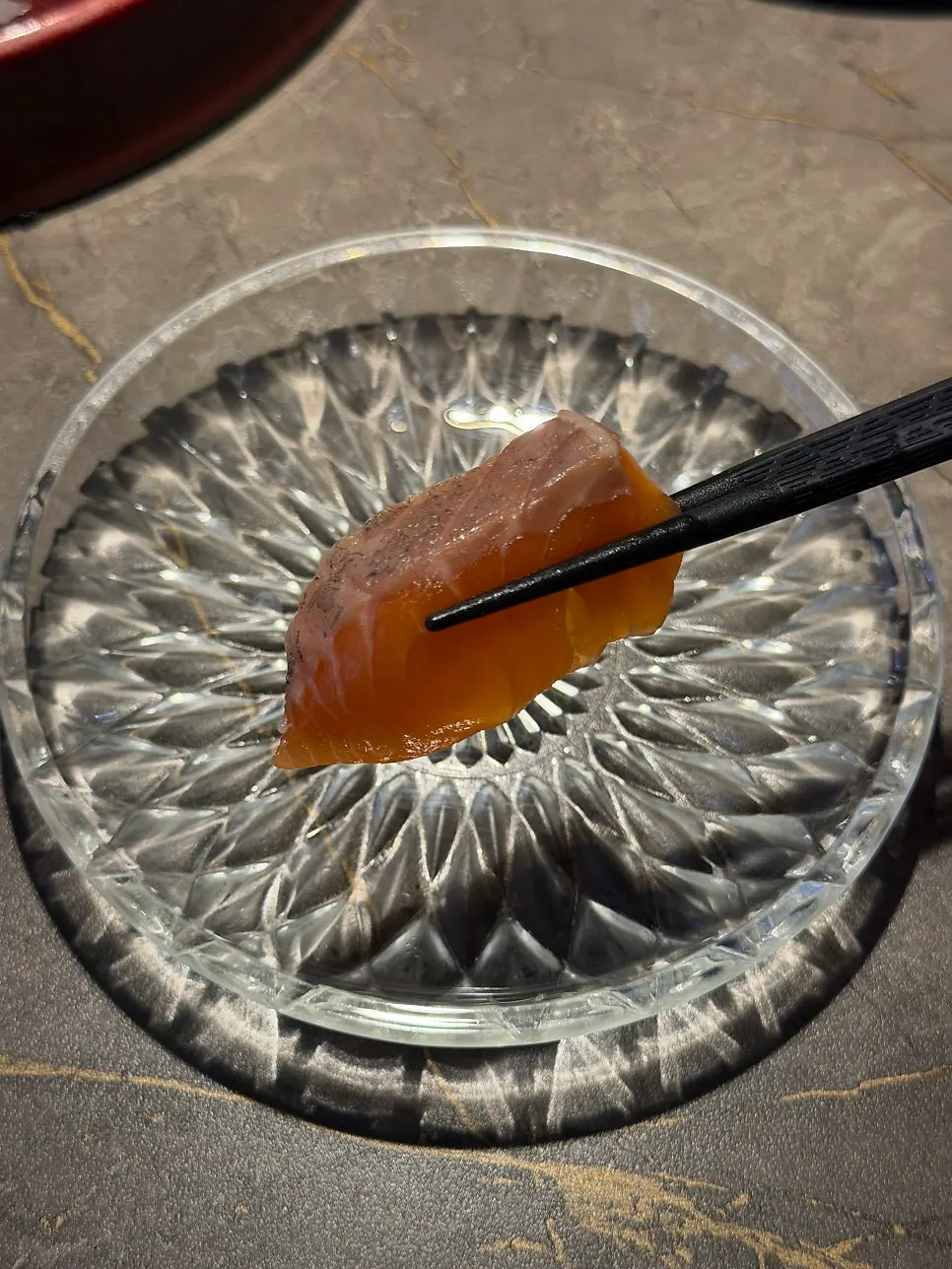 Close-up of aged salmon sashimi