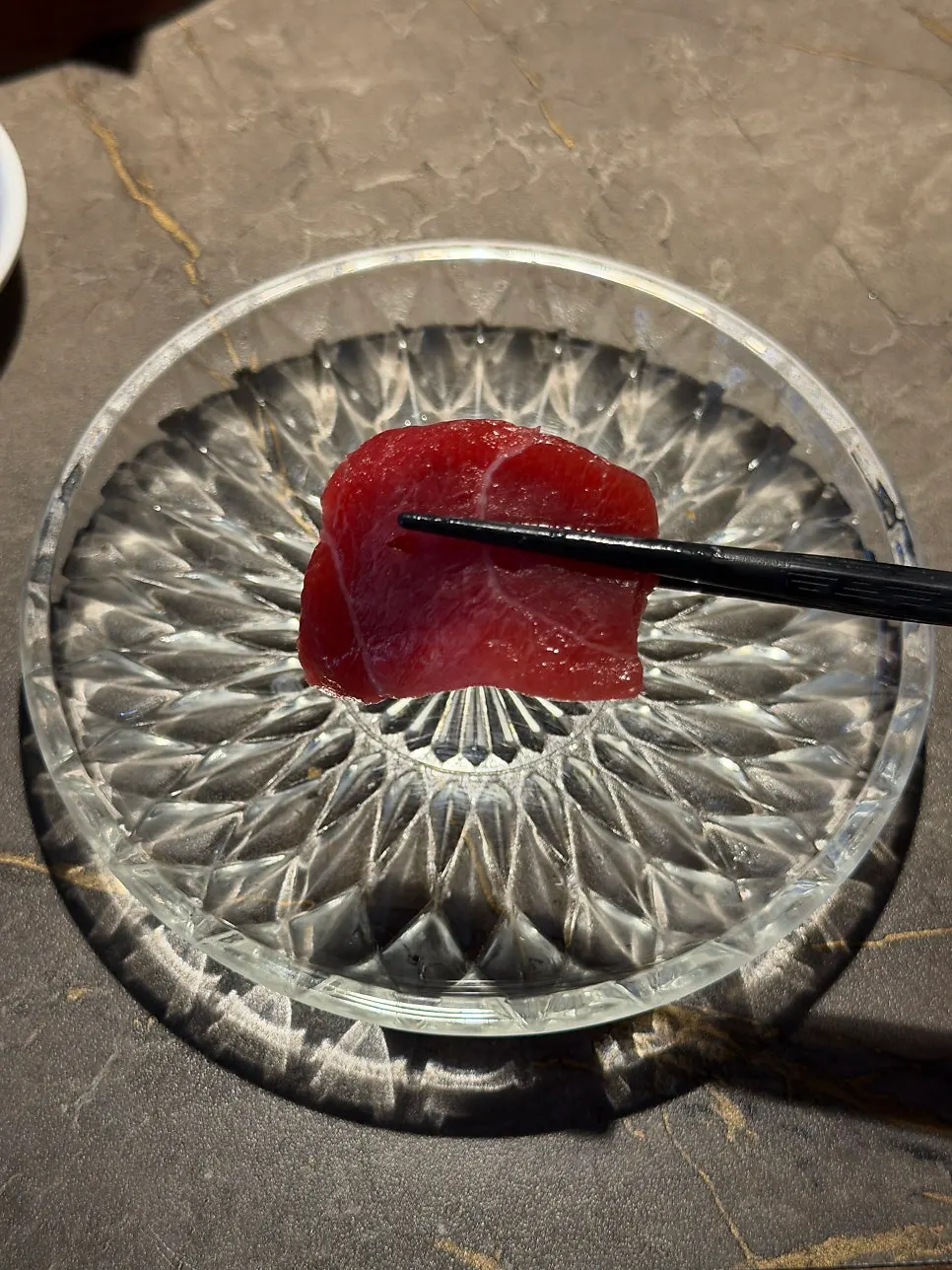 A piece of aged bluefin tuna sashimi