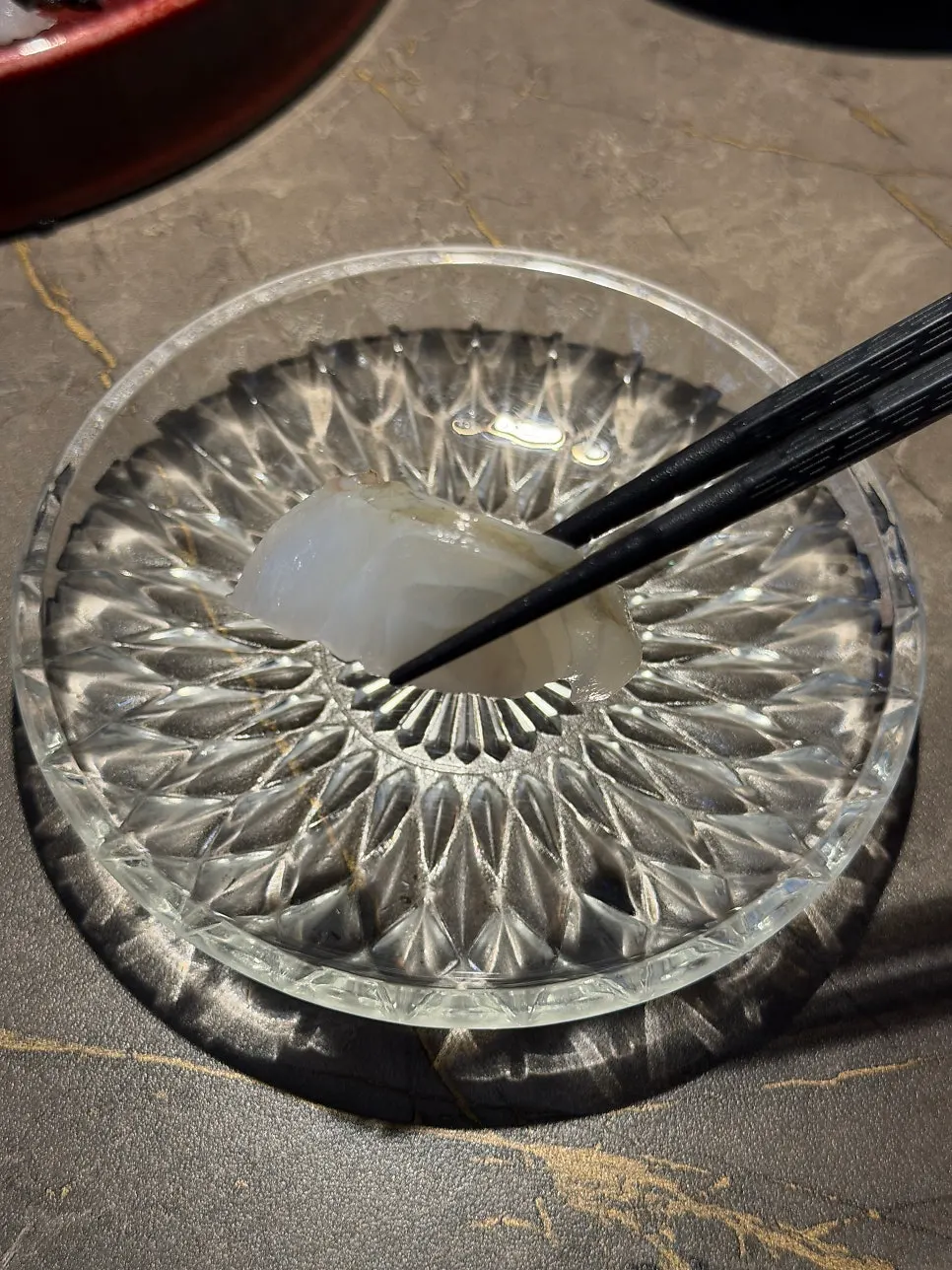 Close-up of aged yellowtail amberjack sashimi