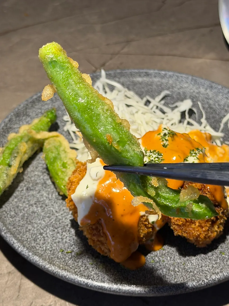 Crab innard cream croquette split in half with fried kkwarigochu