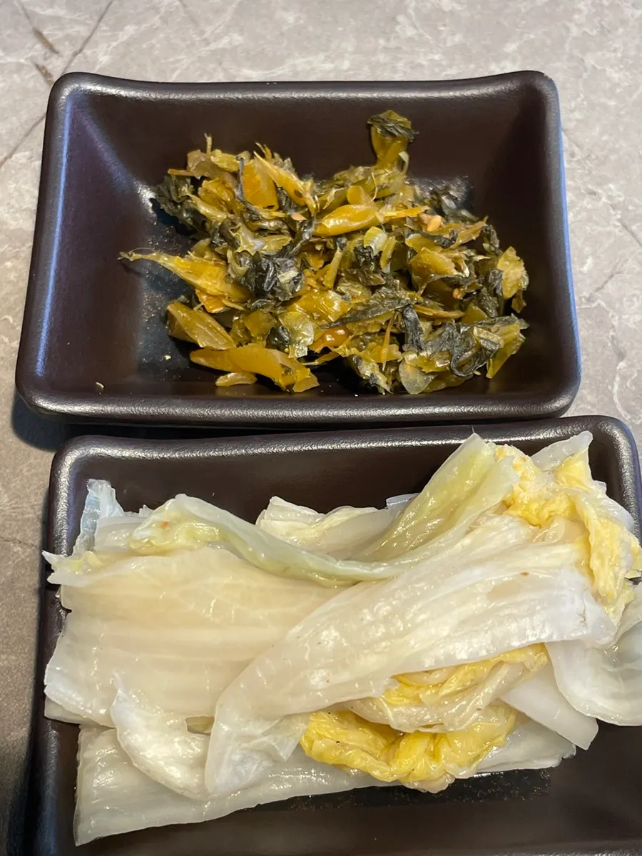 Namul side dish with a mountain of baek-kimchi