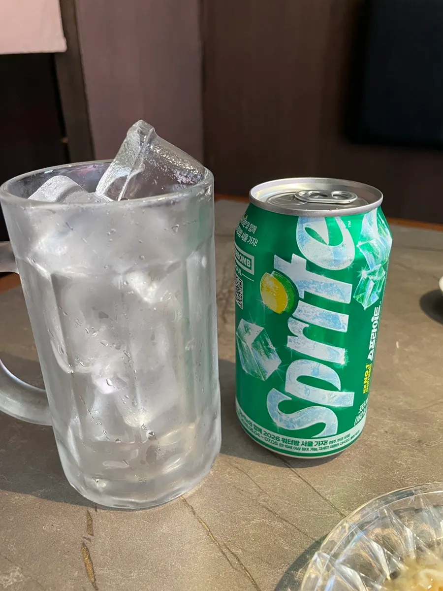 Cold Sprite poured into a glass