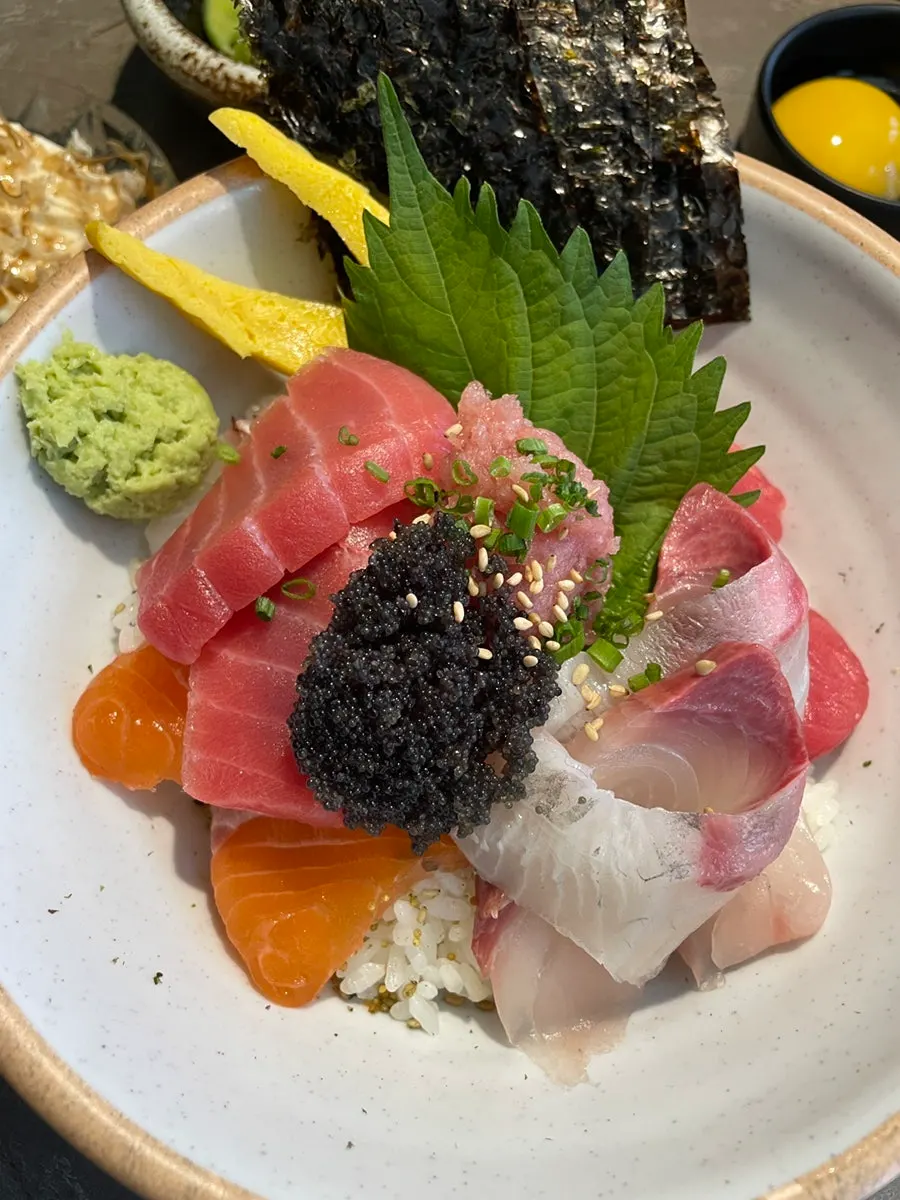Picking up a piece of aged sashimi