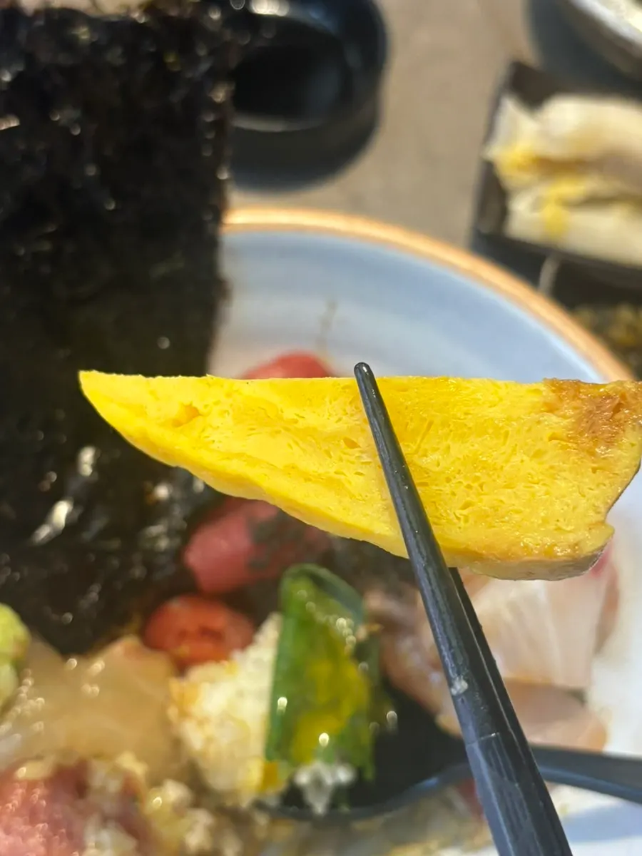 The last bite with a side of rolled egg