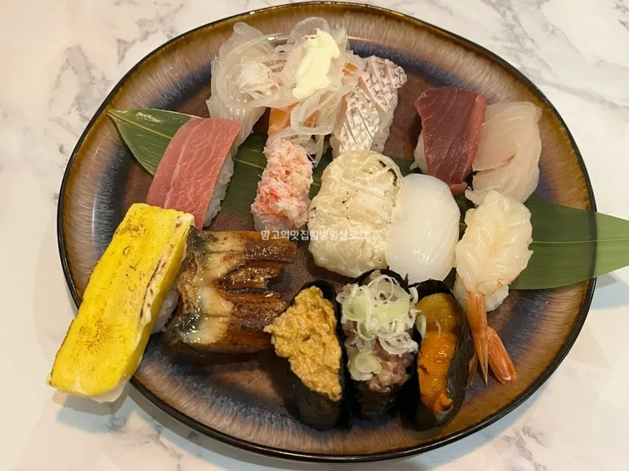 Order tablet, pickled radish, ginger, and house-made soy sauce on the table