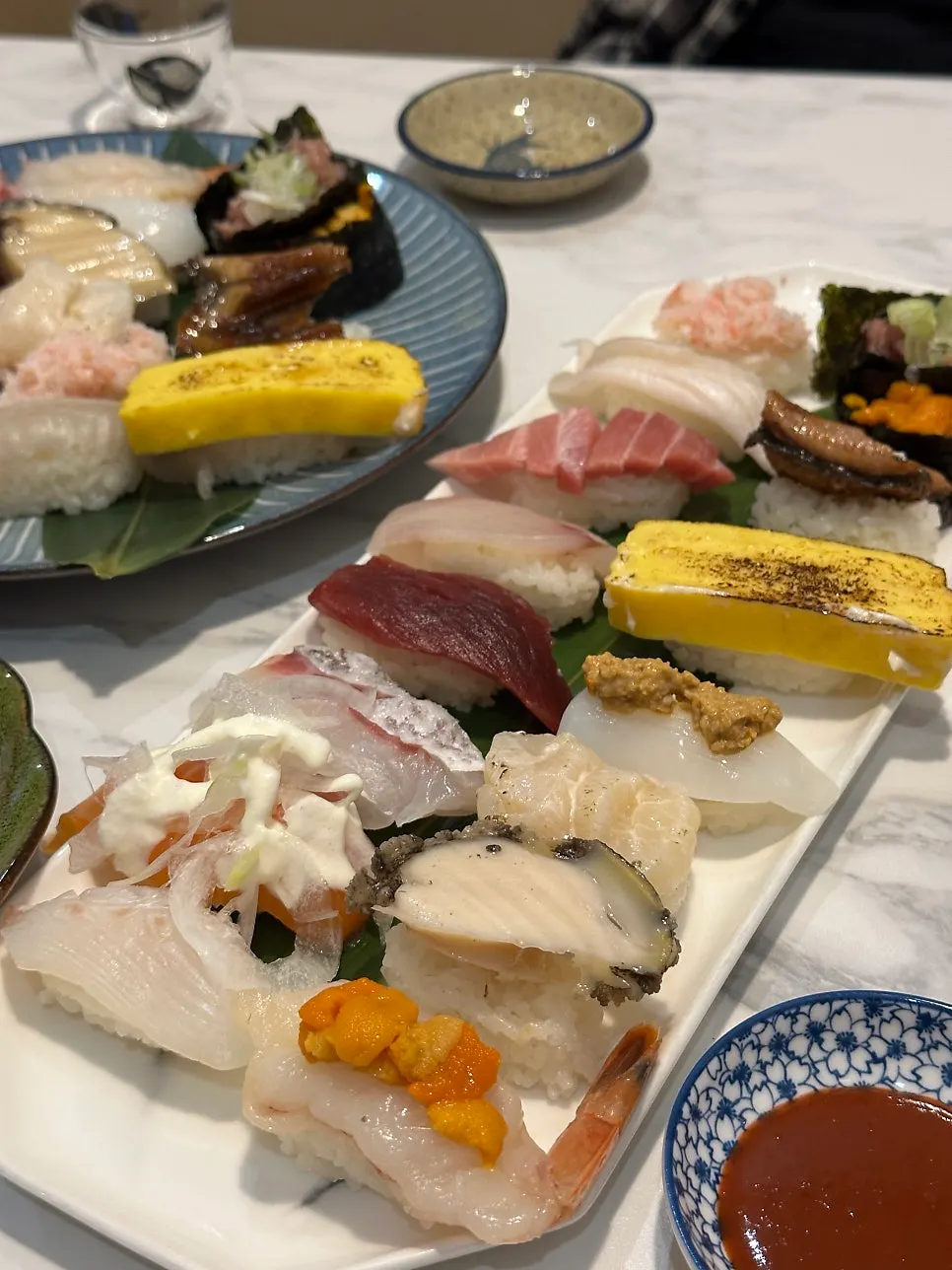 Sushi topped with sea urchin roe and ankimo