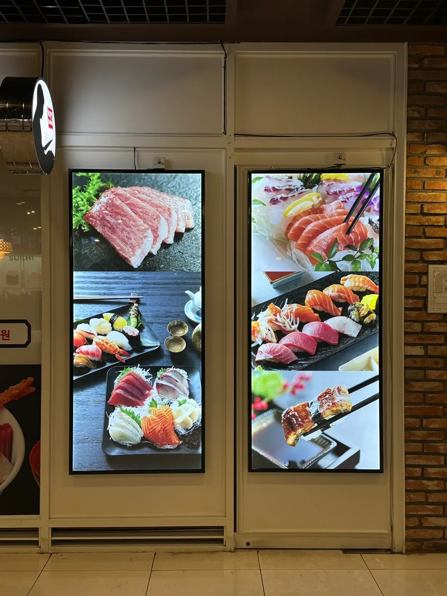 Entrance to Choe Uyeong Sushiya Jongno Branch next to the B1 elevator