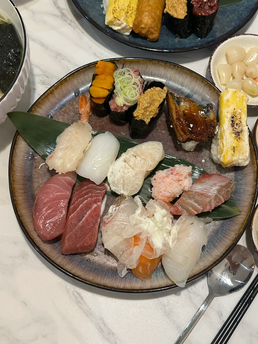 All five menu items served together on the table
