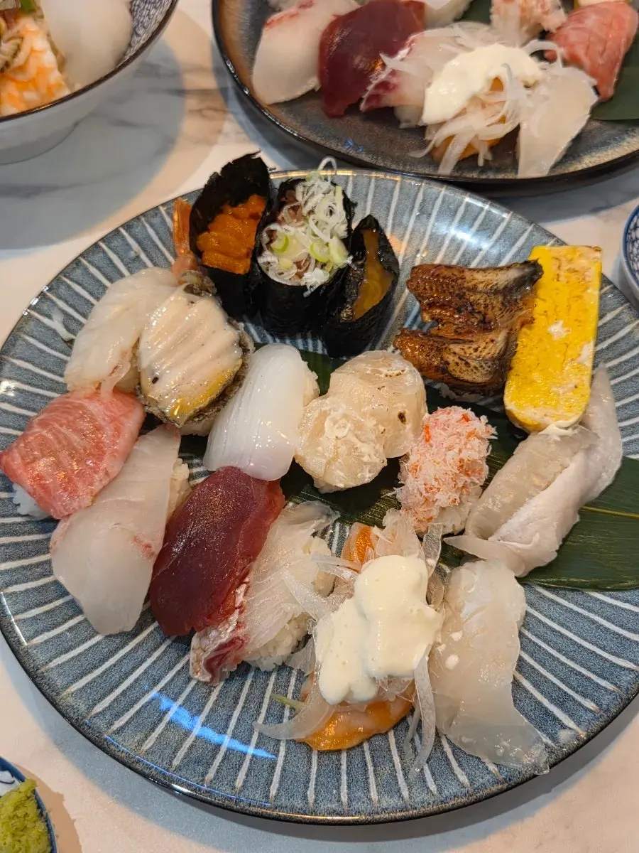 A plate of the 16-piece premium sushi set