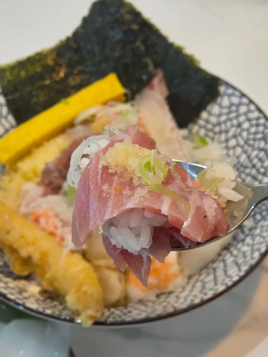 Close-up of thick sashimi slices on the kaisendon