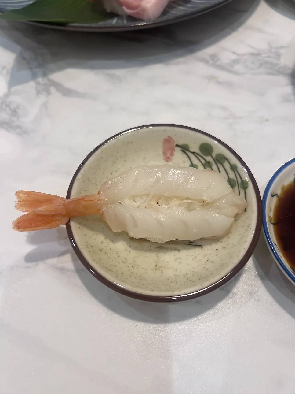 Seared raw shrimp sushi