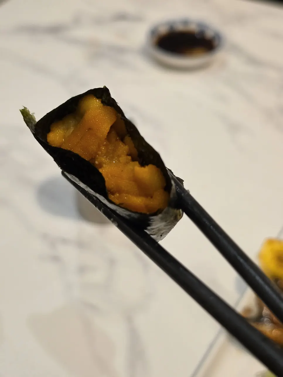 Various pieces from the premium sushi set including engawa
