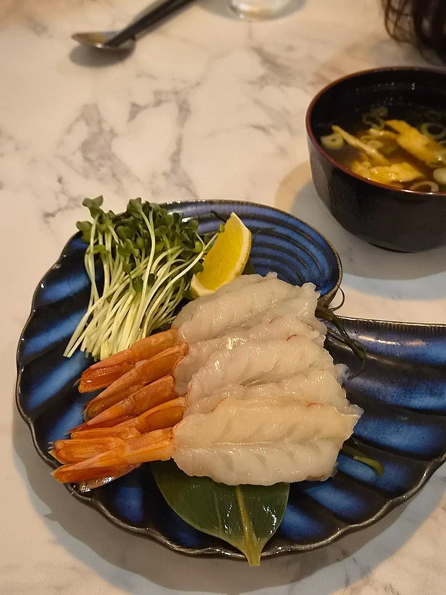 Close-up of plump red shrimp sashimi