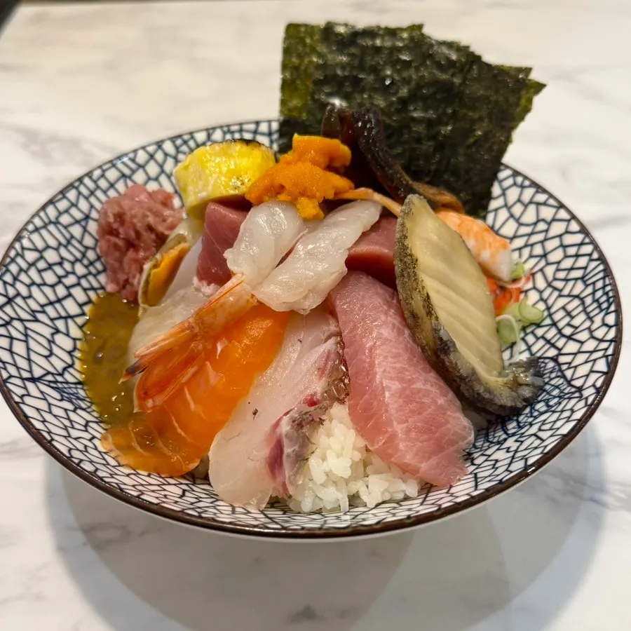 Top-tier kaisendon topped with salmon and tuna