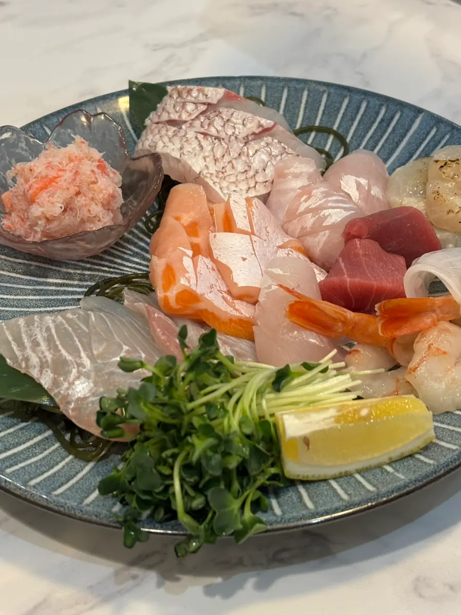 A plate of thickly sliced mixed sashimi