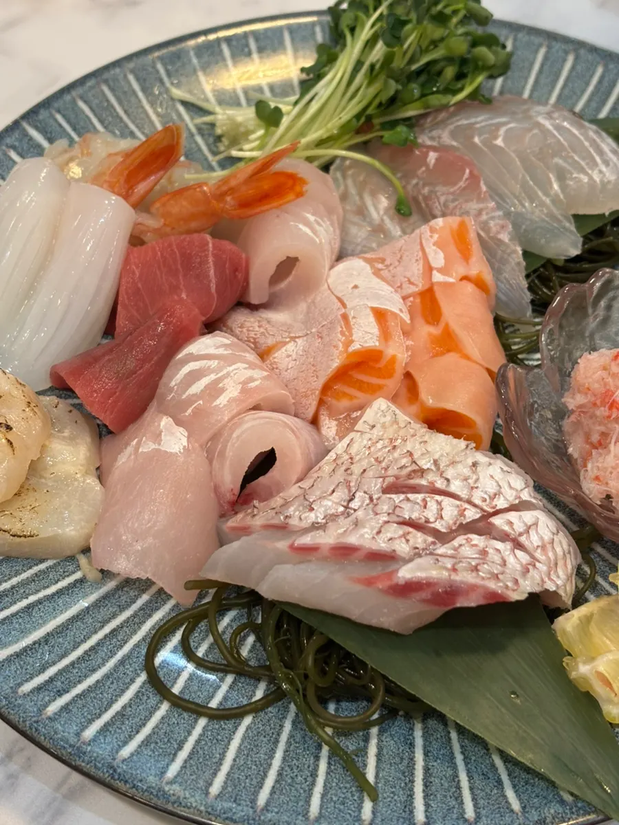 Close-up of salmon and red seabream on the mixed sashimi platter