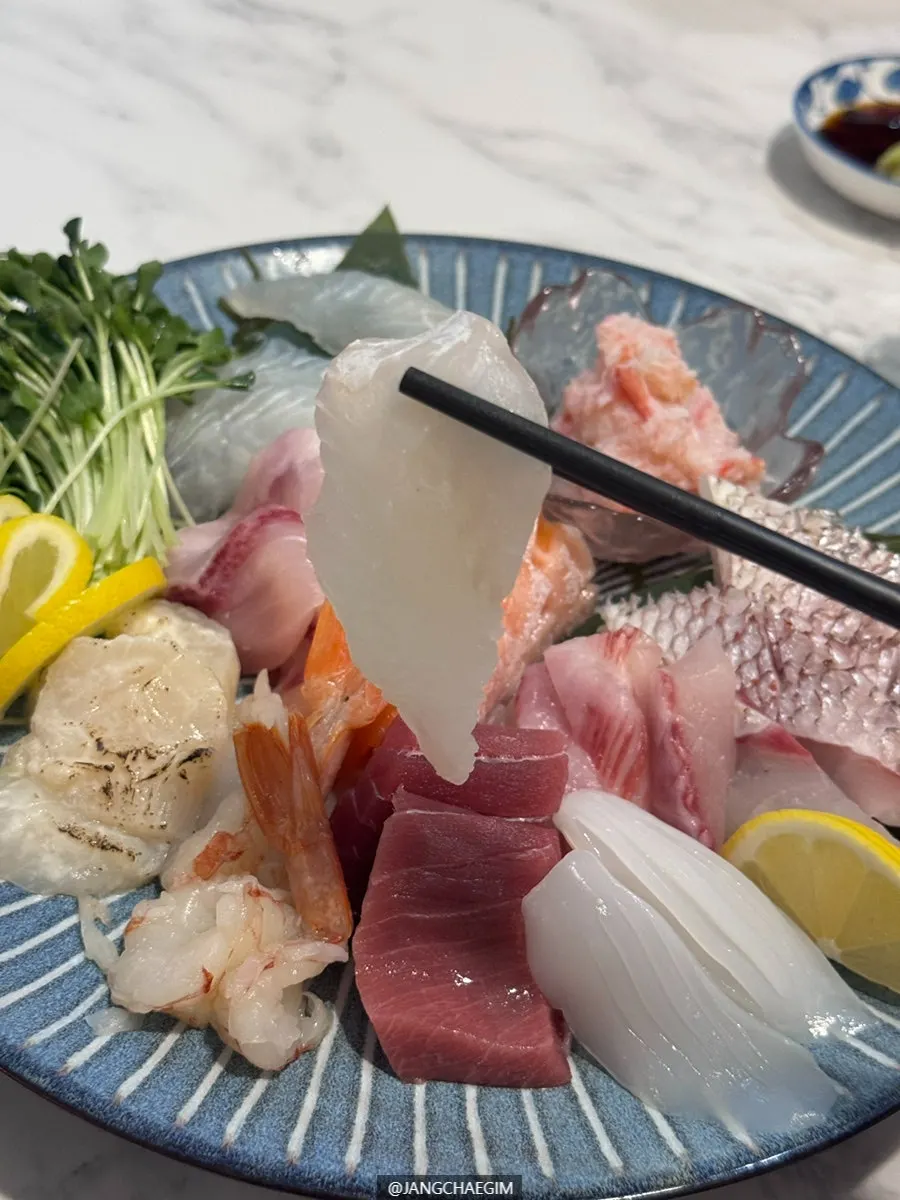 Plate of thickly sliced mixed sashimi