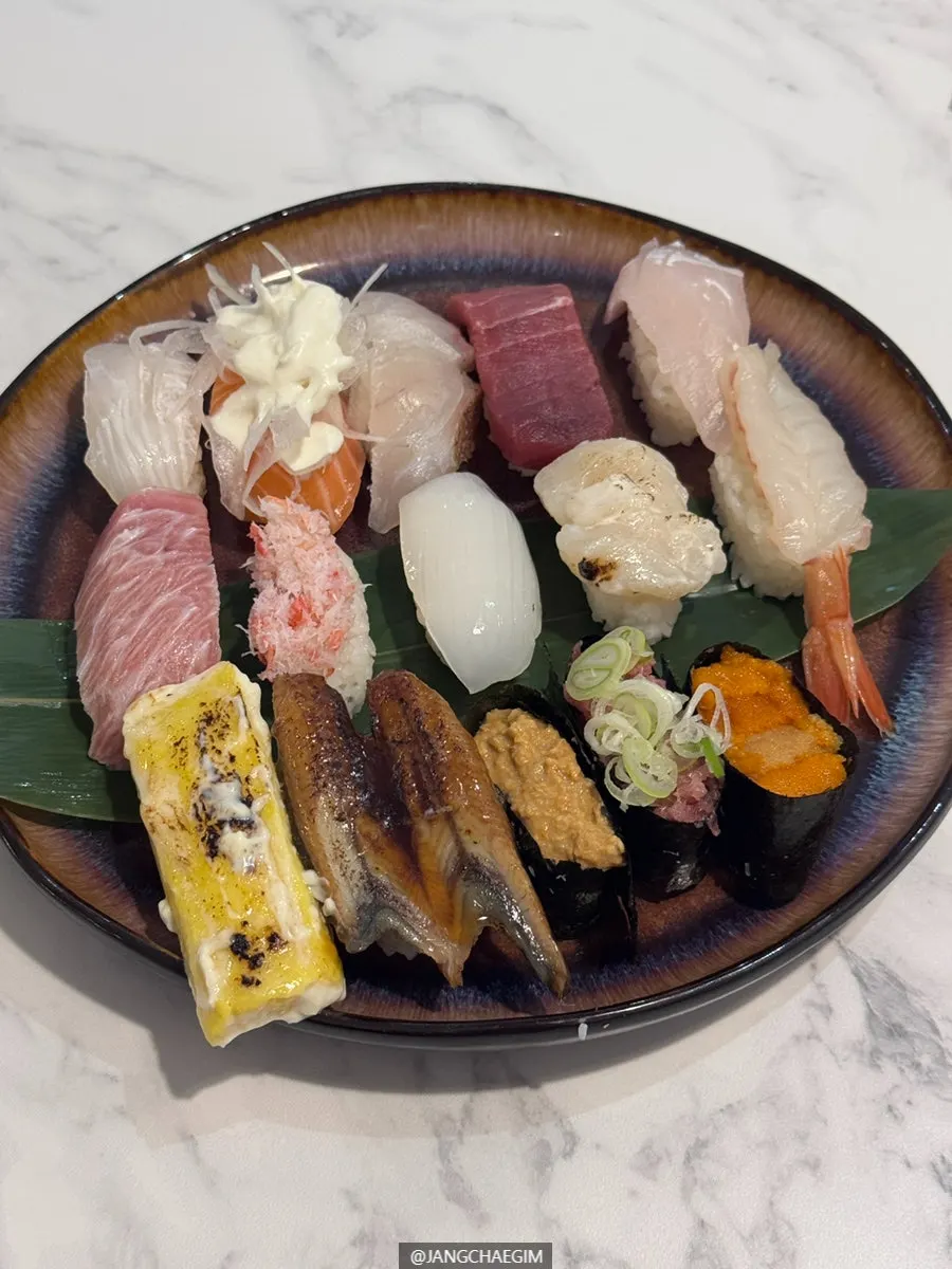 Fried tofu broth served alongside the sashimi