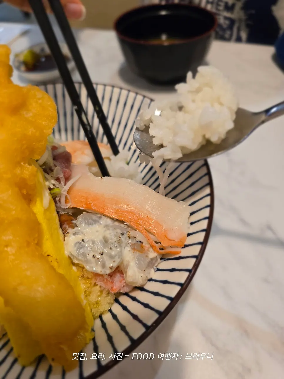 Close-up of fish on top of the kaisendon