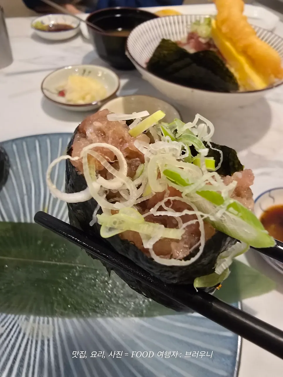 A piece of red fish sushi