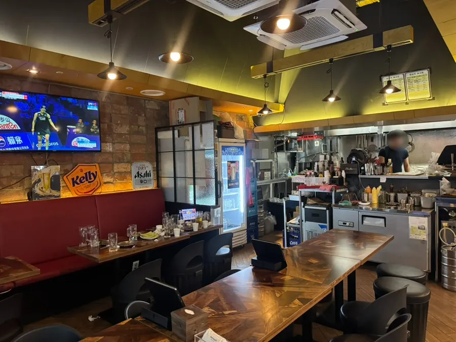 Tables inside the main hall of Didi's Pizza Pub