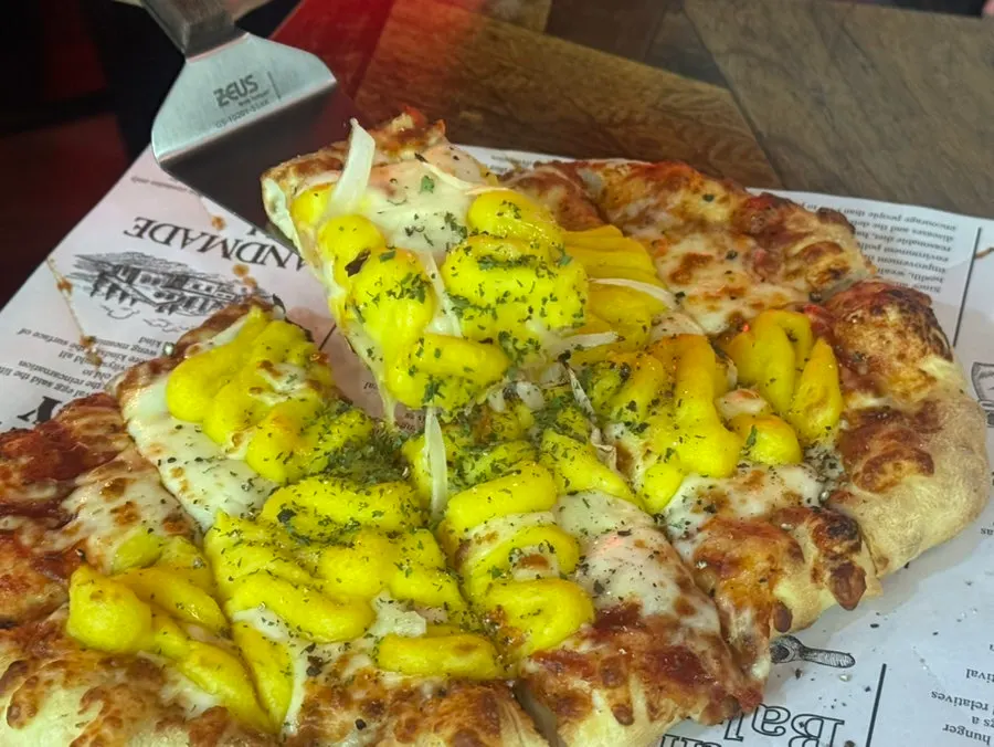 Sweet potato pizza piled high with sweet potato mousse