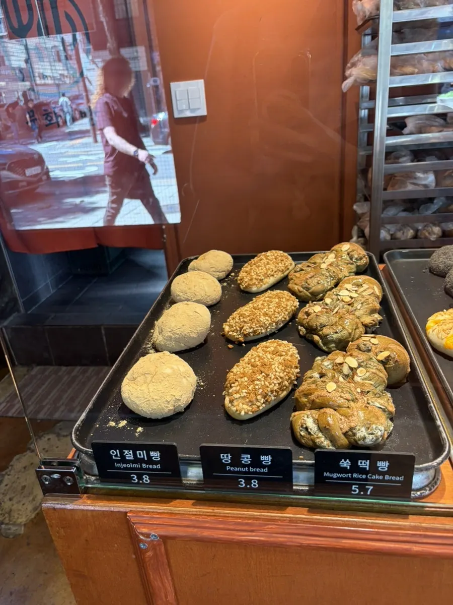 The cramped, takeaway-only interior of Munhwa Bakery