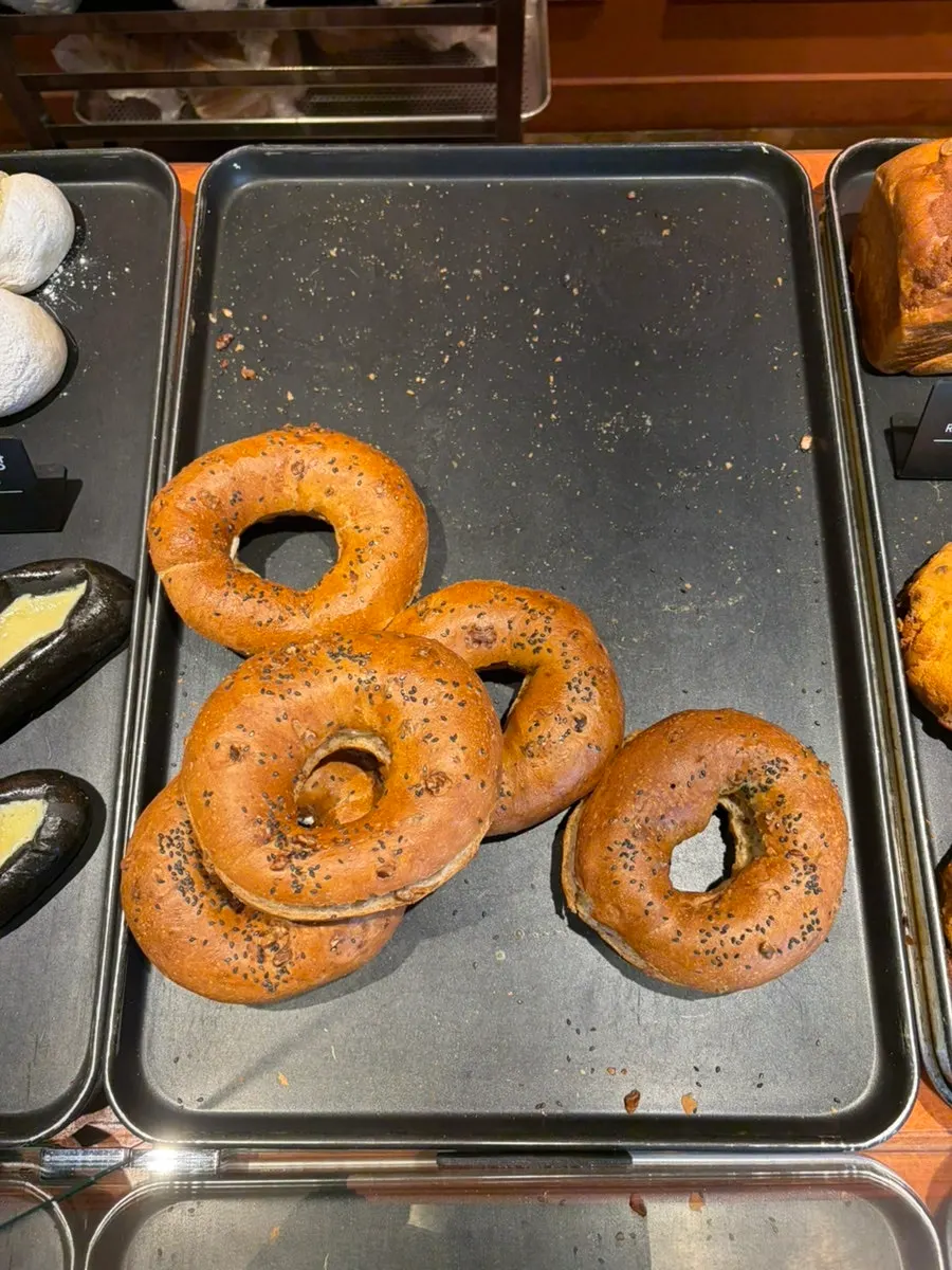 Individually packaged squid ink milk cream bread