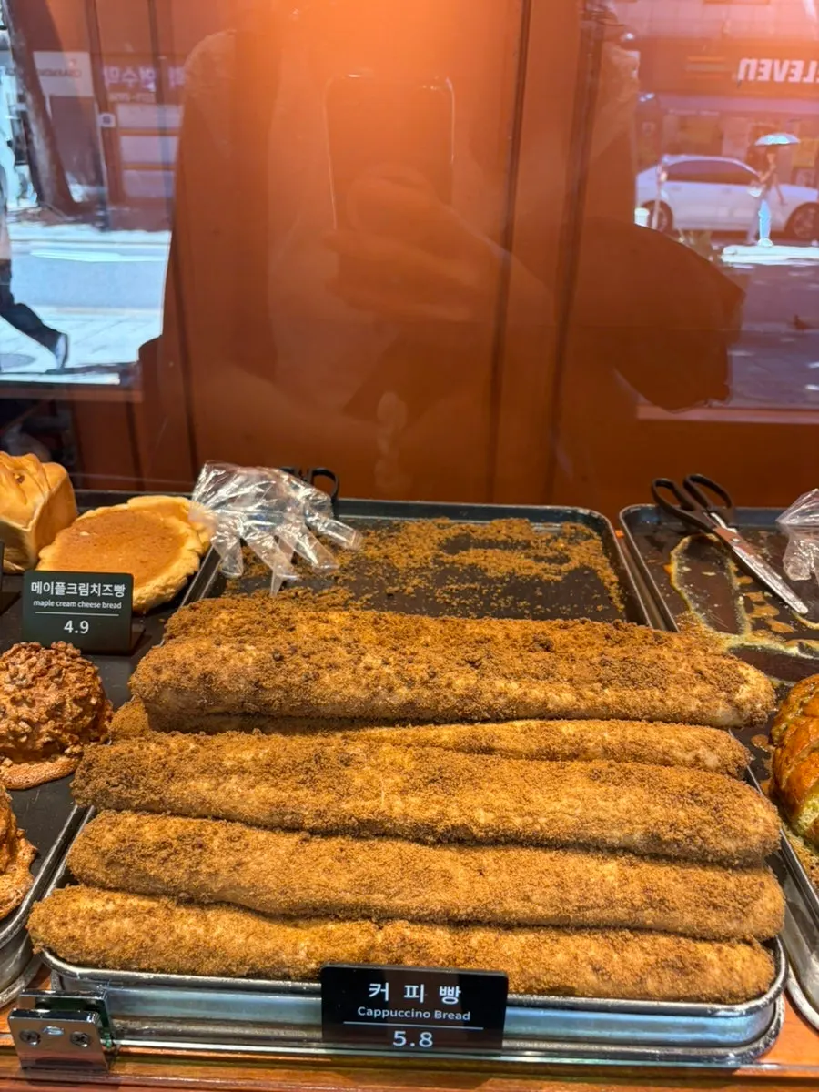 Sliced bread displayed on the shelf at Munhwa Bakery