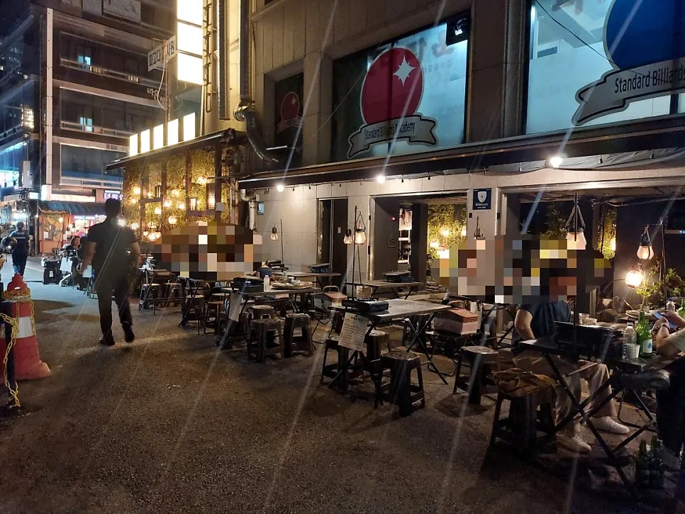 Wide shot showing the full outdoor seating area