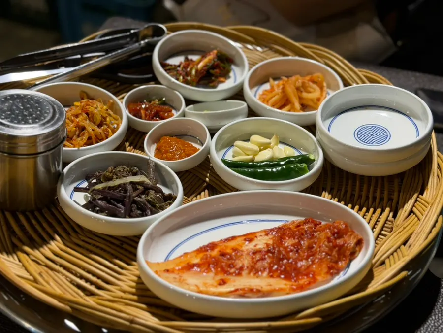 Bracken fern namul, green onion kimchi, and other banchan