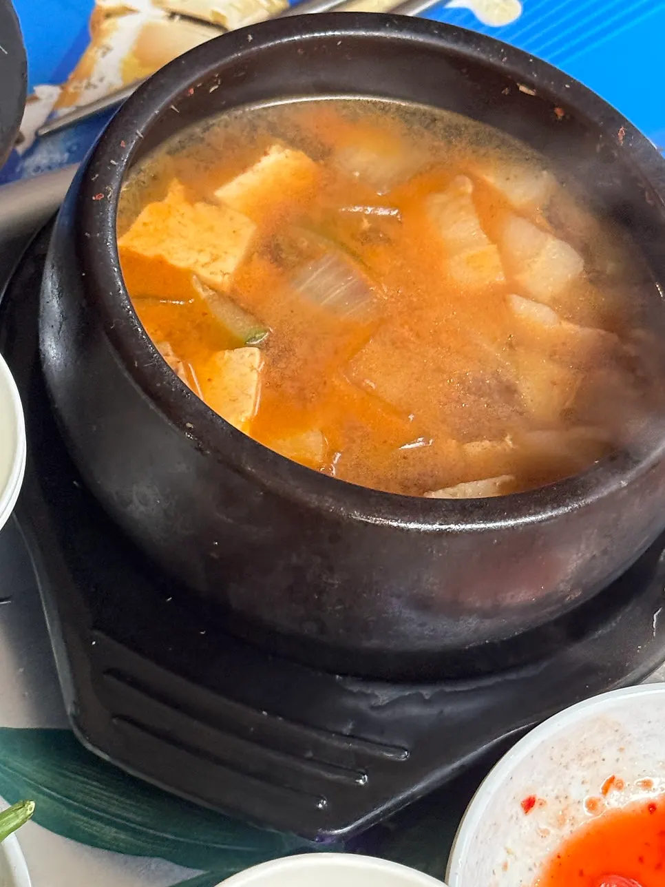 Naengsam and side dishes on the outdoor table