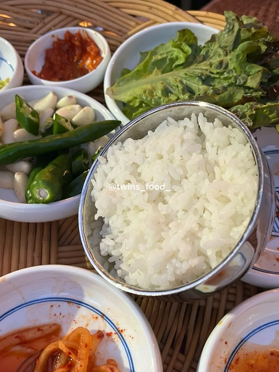 Kimchi and side dishes grilled together in pork fat