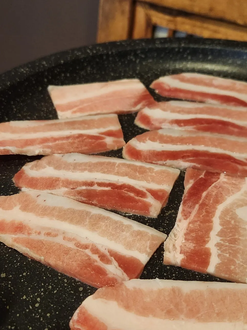 A piece of pork belly cooked just until the pink is gone