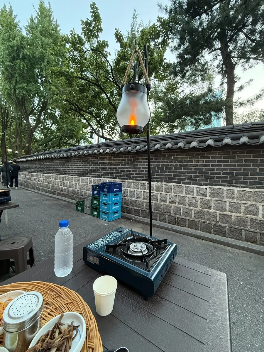 Spacious outdoor tables set up in front of the restaurant