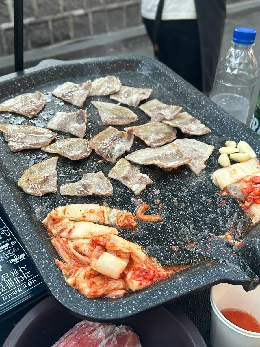Frozen pork belly grilling on the plate