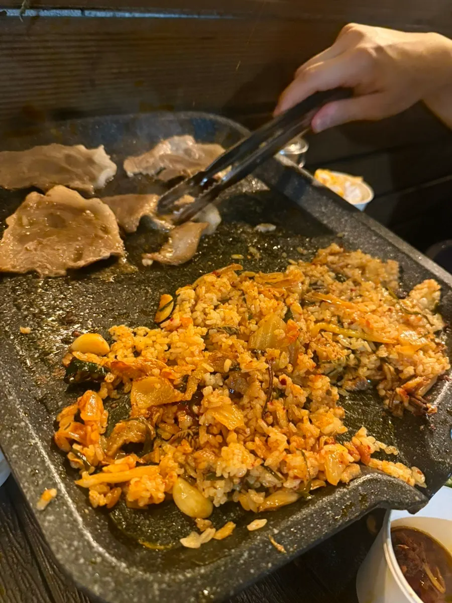 Kimchi fried rice being cooked on the grill